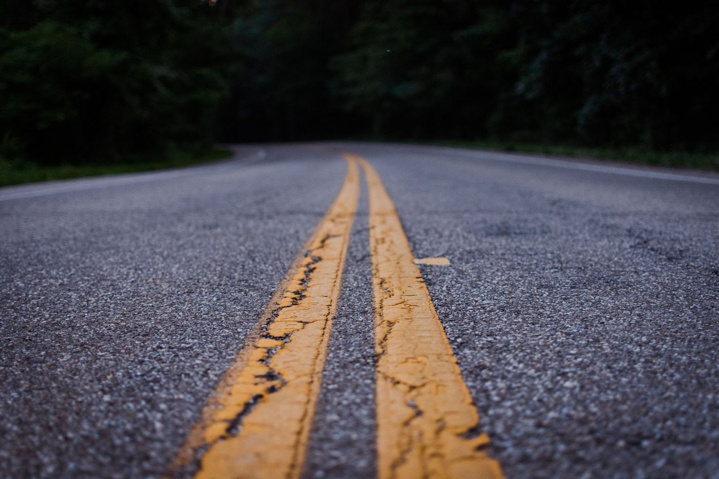 Highway centerline at dusk